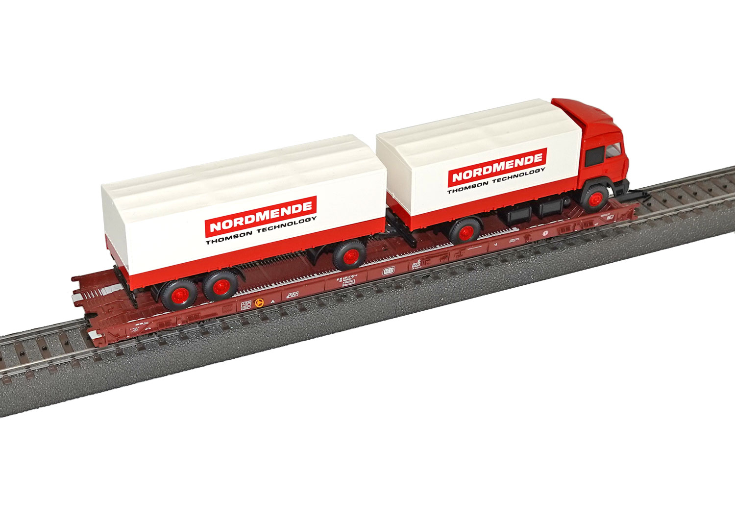 Märklin 4743 DB Niederflurwagen mit Wiking LKW Nordmende